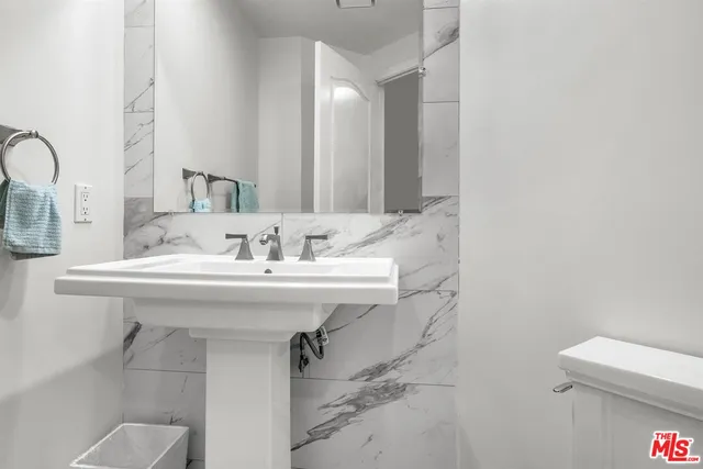 a bathroom with a sink and a toilet