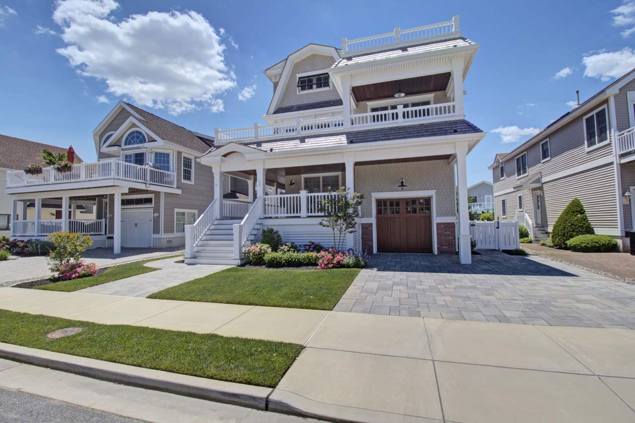 a front view of a building with garden