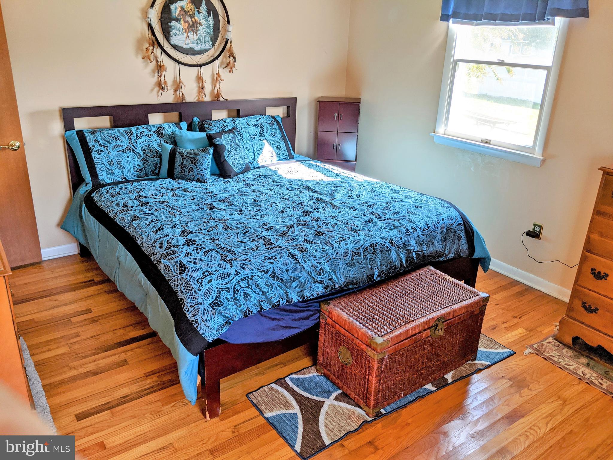 1342 Calvert Road Chester, MD 21619 - Photo 23 of 29 a bed room with a bed and a window