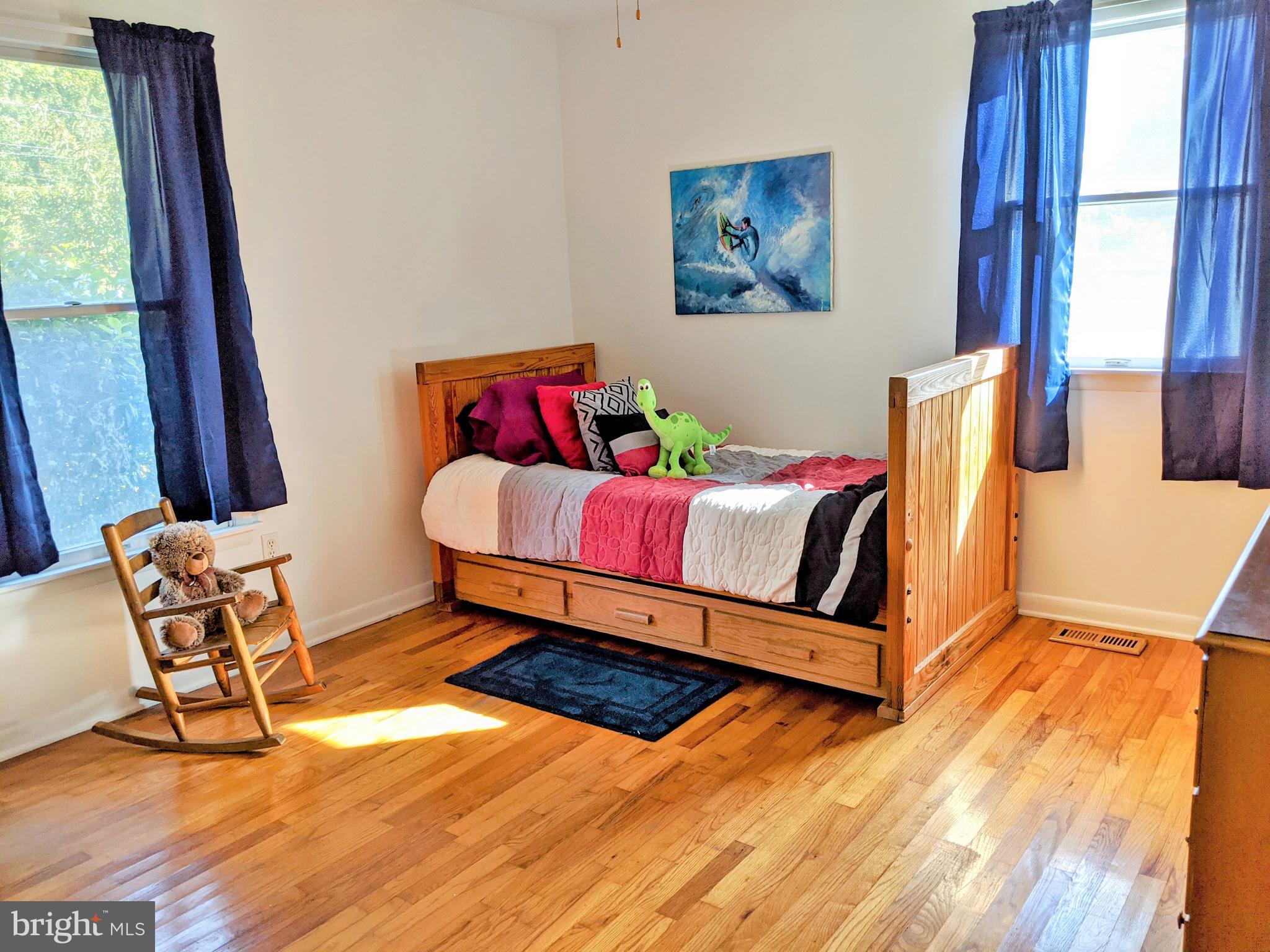 1342 Calvert Road Chester, MD 21619 - Photo 24 of 29 a room with a bed and a chair