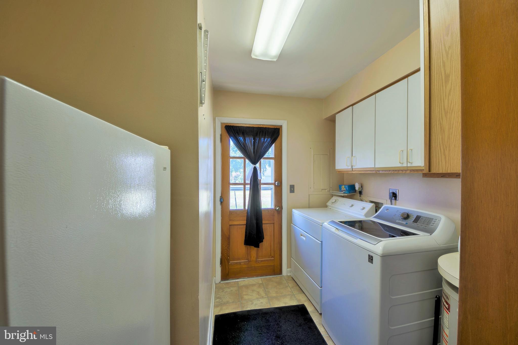 1342 Calvert Road Chester, MD 21619 - Photo 25 of 29 a bathroom with a sink and a mirror