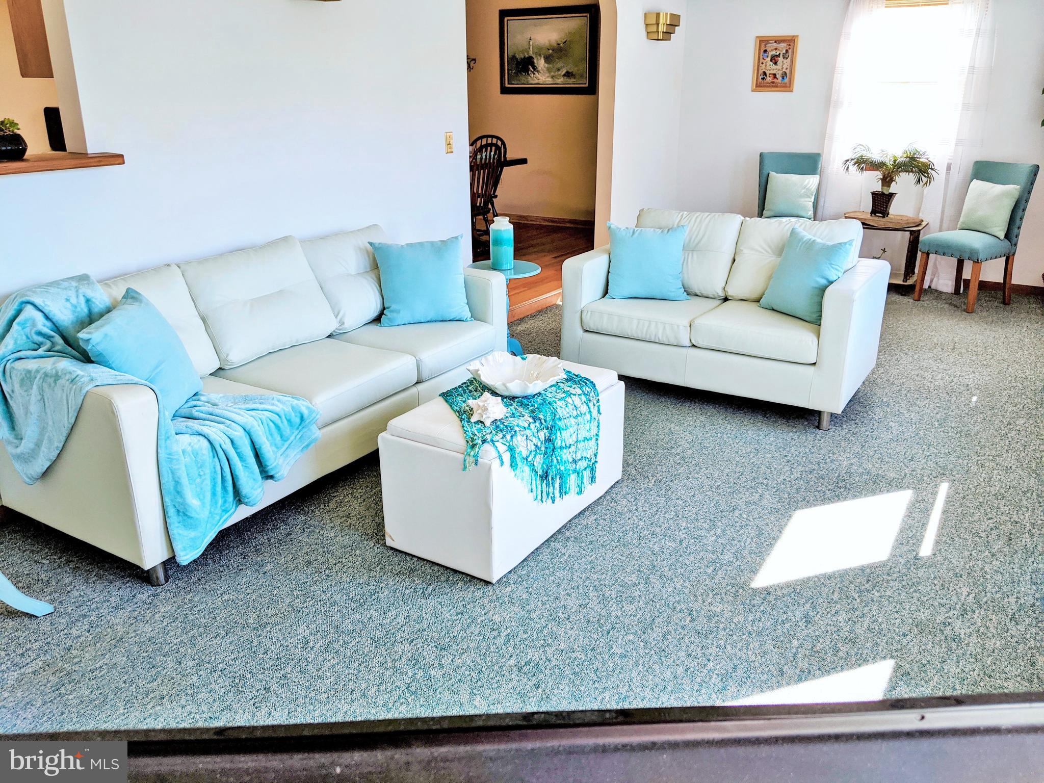 1342 Calvert Road Chester, MD 21619 - Photo 6 of 29 a living room with furniture and a couch