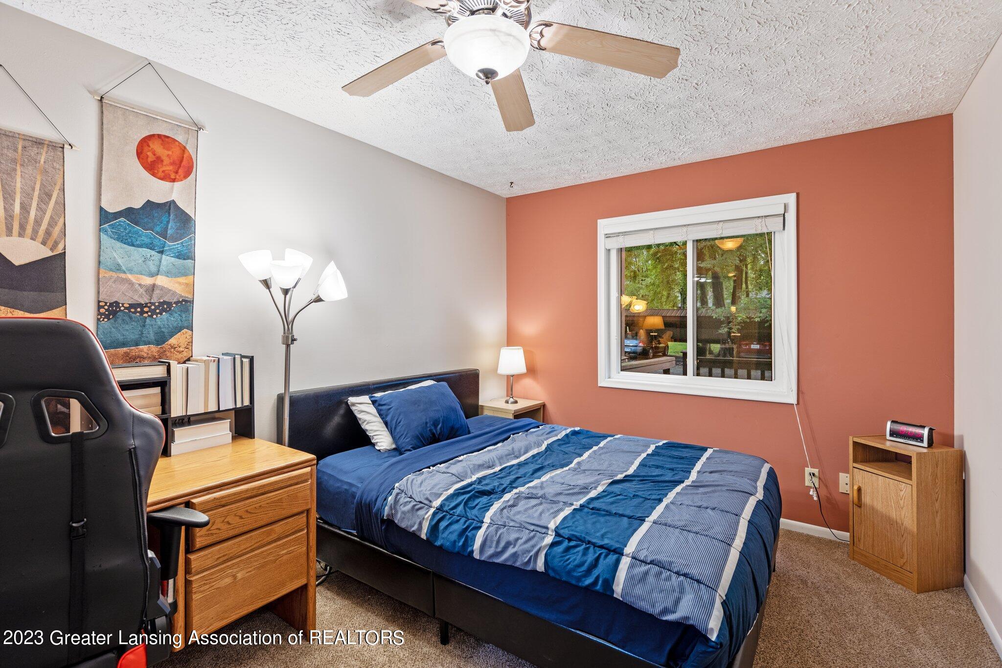 205 East Jolly Road, Unit 2 Lansing, MI 48910 - Photo 12 of 21 Primary Bedroom