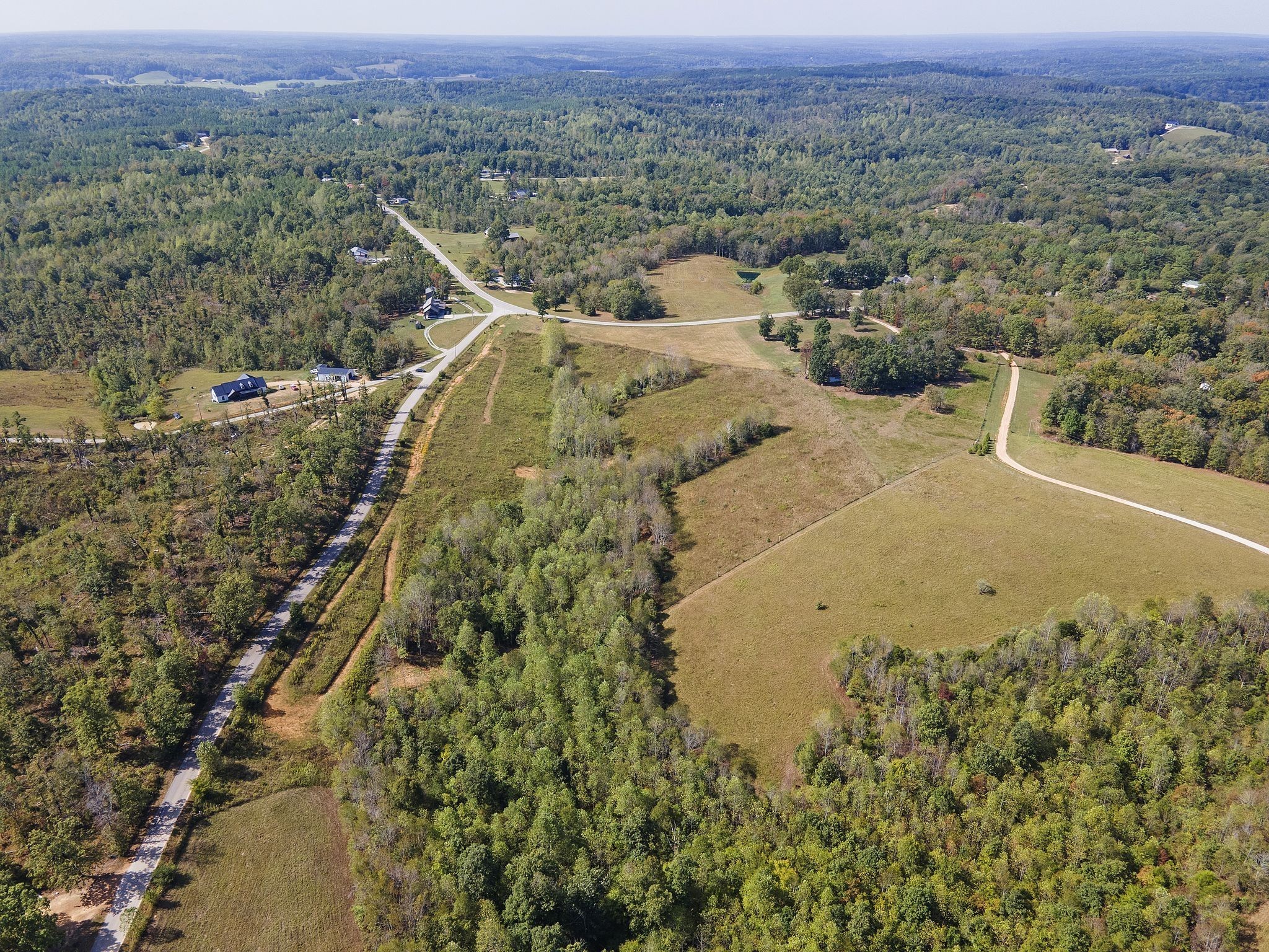 2047 Buffalo Road Hohenwald, TN 38462 - Photo 22 of 25 an aerial view of a house with a yard