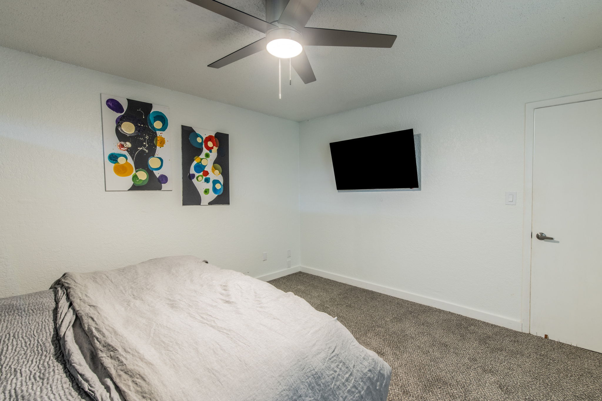 1008 Milford Way Austin, TX 78745 - Photo 31 of 40 Bedroom featuring light gray carpet flooring and white walls
