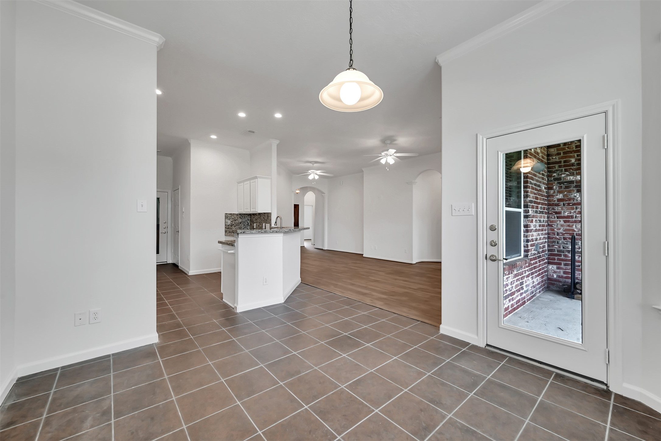 47 Presidio Road Montgomery, TX 77356 - Photo 11 of 35 a view of a kitchen and a refrigerator in a kitchen