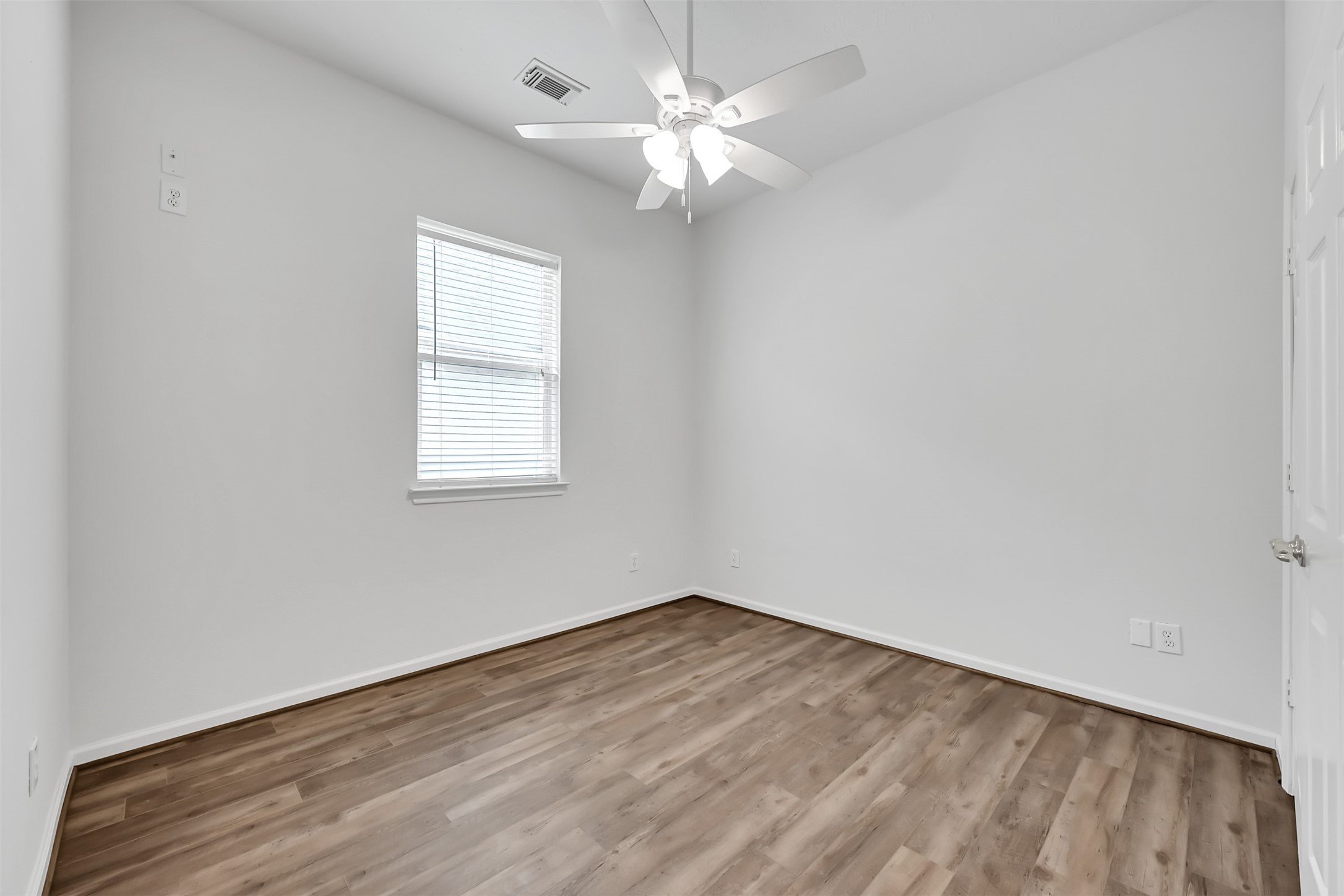 47 Presidio Road Montgomery, TX 77356 - Photo 21 of 35 an empty room with a window and a fan