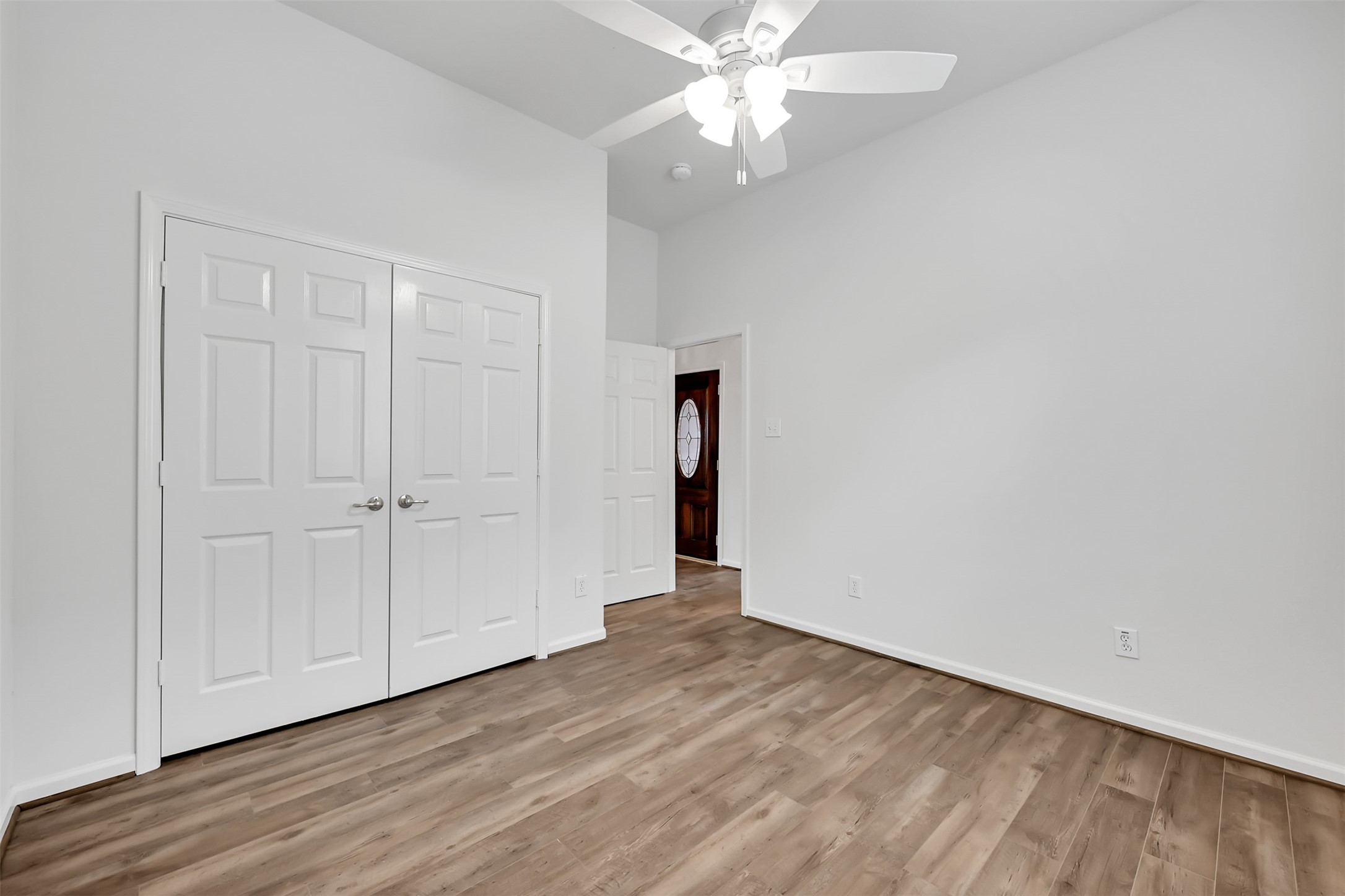 47 Presidio Road Montgomery, TX 77356 - Photo 25 of 35 a view of an empty room with wooden floor