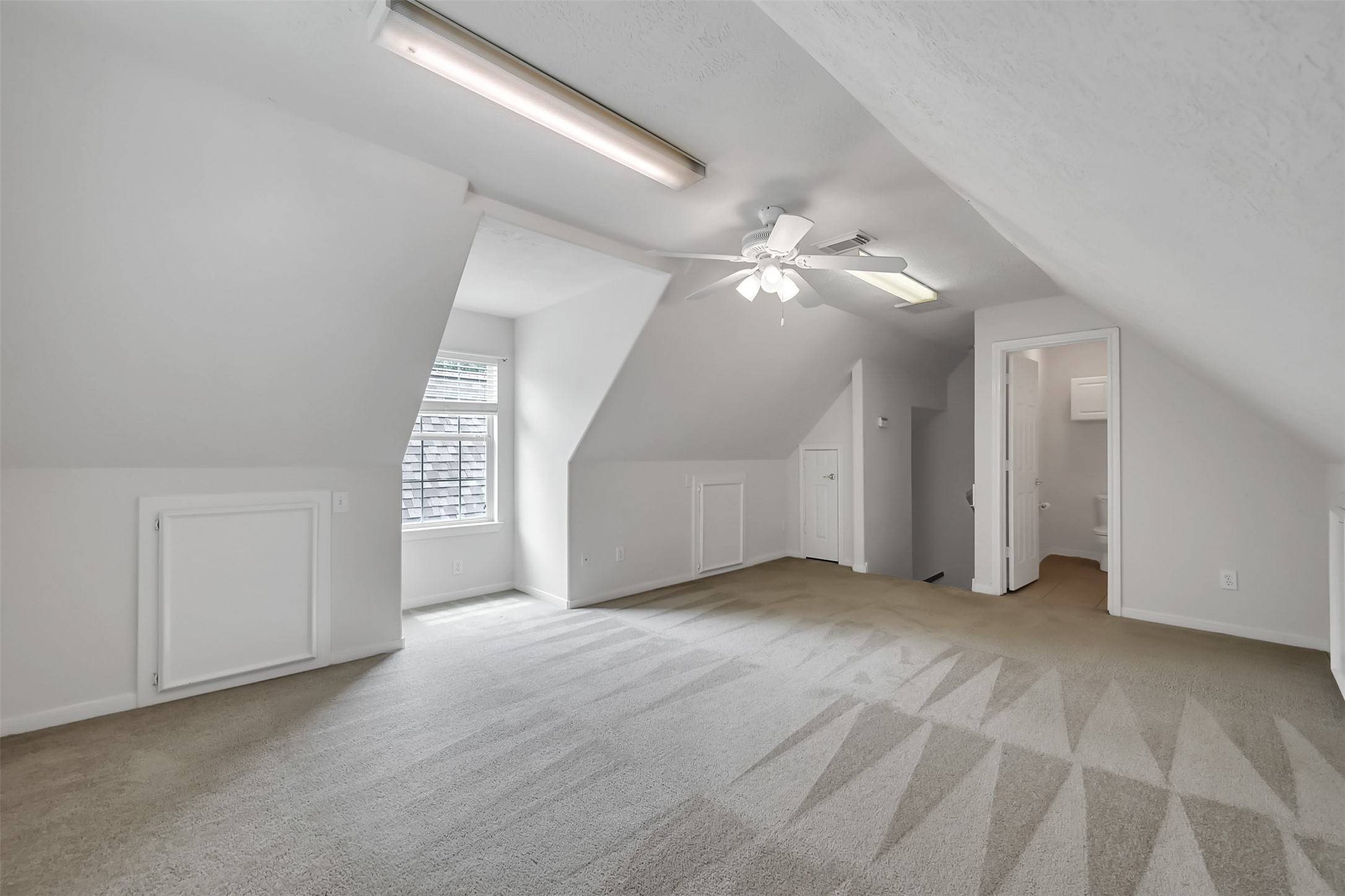 47 Presidio Road Montgomery, TX 77356 - Photo 28 of 35 an empty room with windows and fan