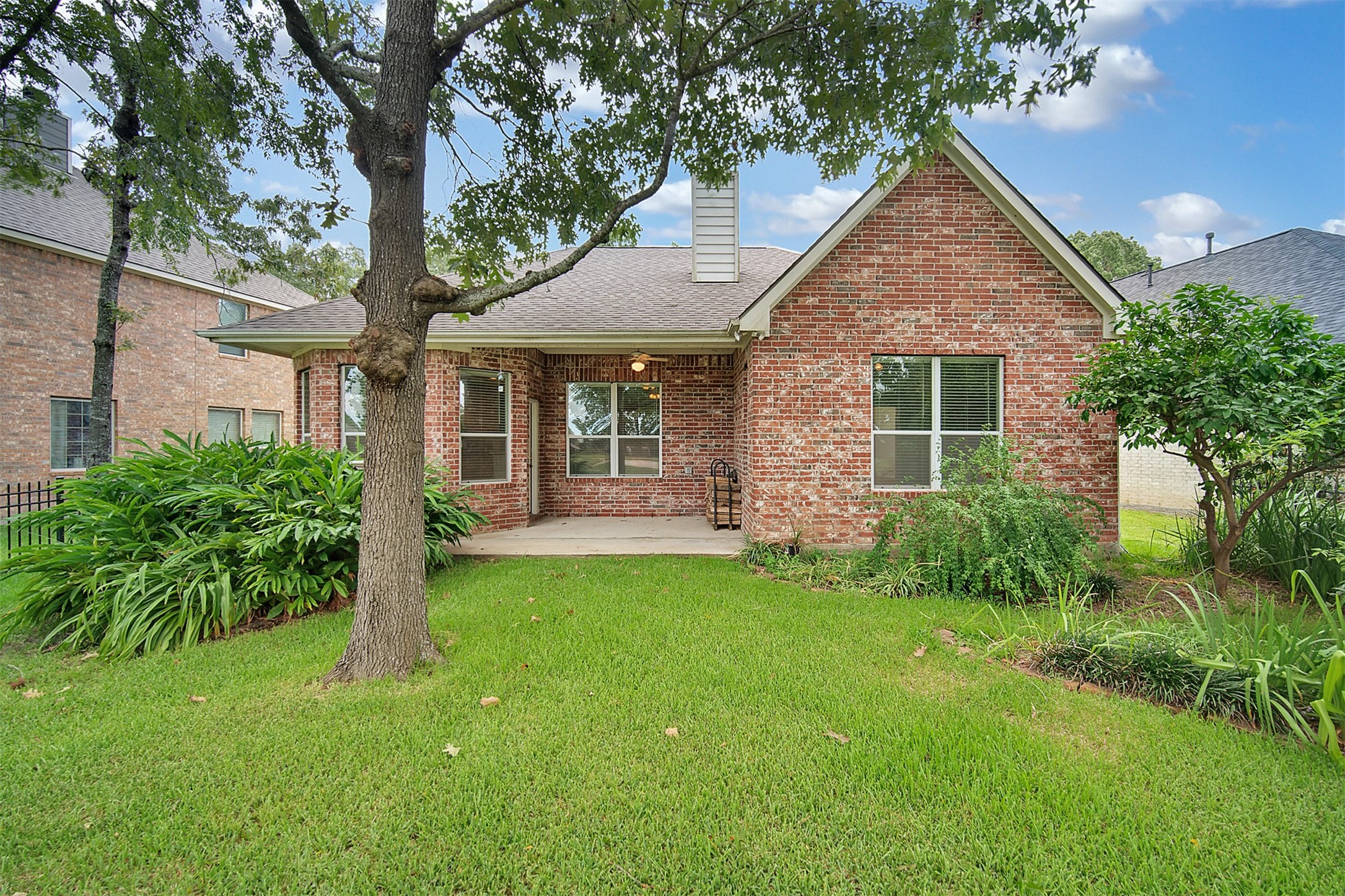 47 Presidio Road Montgomery, TX 77356 - Photo 30 of 35 a view of a house with a yard and potted plants