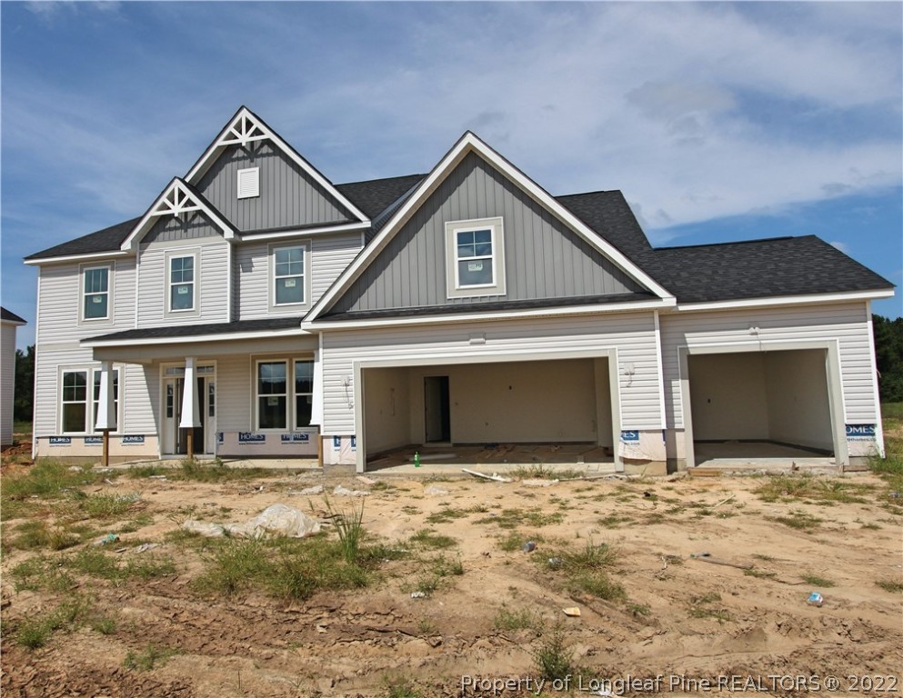 4141 McBryde Road Linden, NC 28356 - Photo 1 of 28 a front view of a house with a yard
