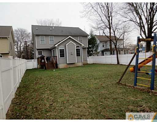 414 New Market Road Dunellen, NJ 08812 - Photo 2 of 25 a view of a house with a yard