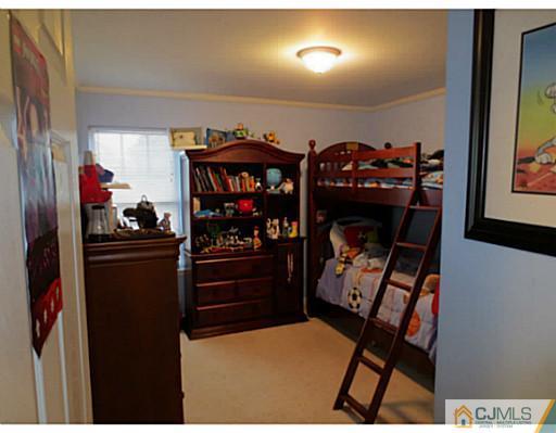 414 New Market Road Dunellen, NJ 08812 - Photo 19 of 25 a view of a hallway and a workspace
