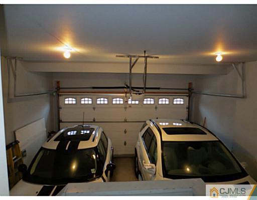 414 New Market Road Dunellen, NJ 08812 - Photo 24 of 25 a car parked in a parking garage