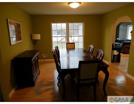 414 New Market Road Dunellen, NJ 08812 - Photo 10 of 25 a view of a dining room with furniture and window