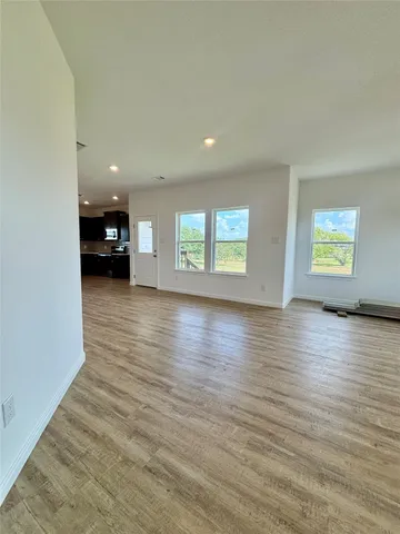 a bathroom with a toilet a sink and a mirror