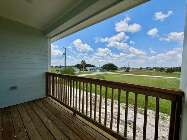 a view of a balcony with an outdoor space
