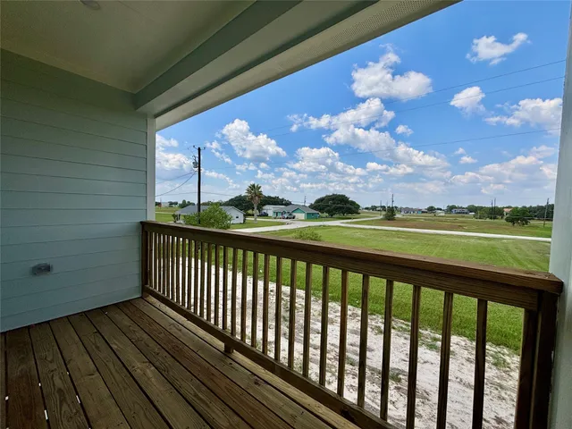 a view of a balcony with an outdoor space