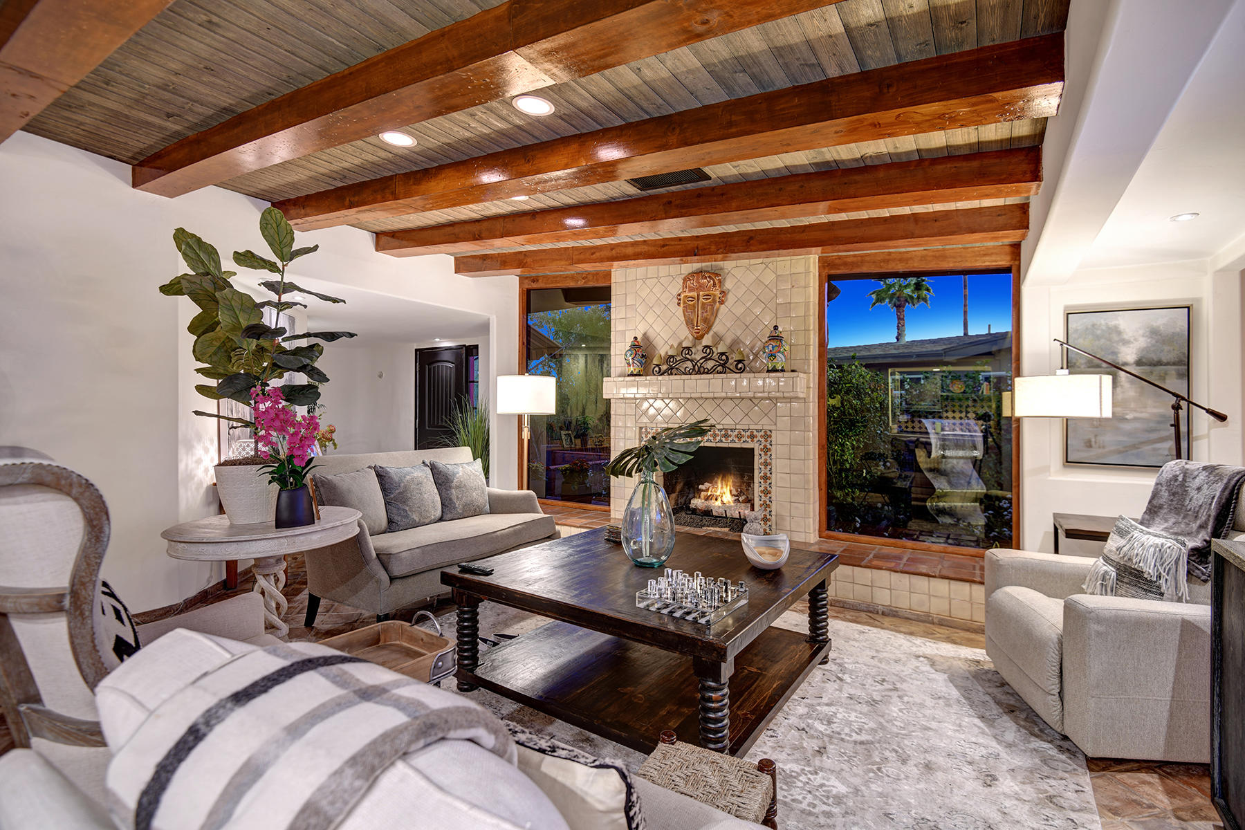 71677 Tunis Road Rancho Mirage, CA 92270 - Photo 1 of 37 a living room with furniture and a fireplace