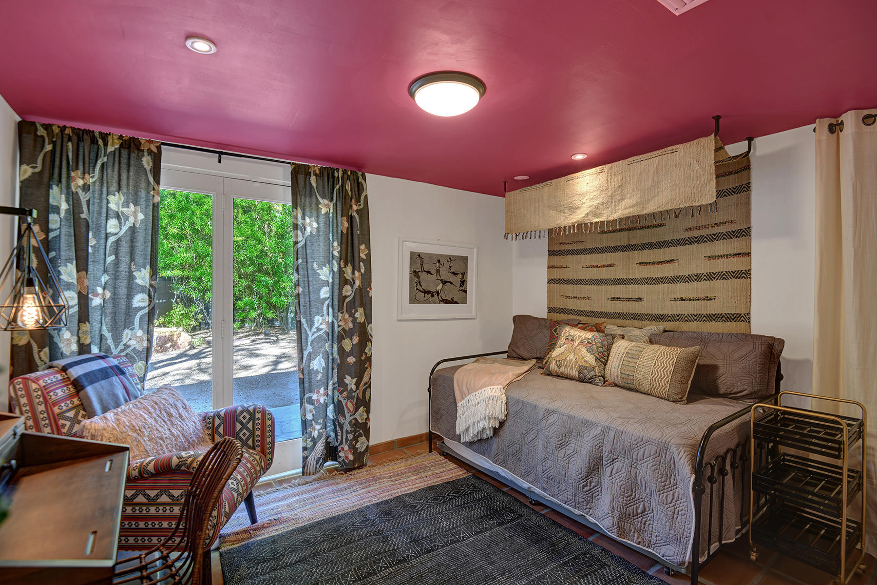 71677 Tunis Road Rancho Mirage, CA 92270 - Photo 22 of 37 a bedroom with a bed and wooden floor