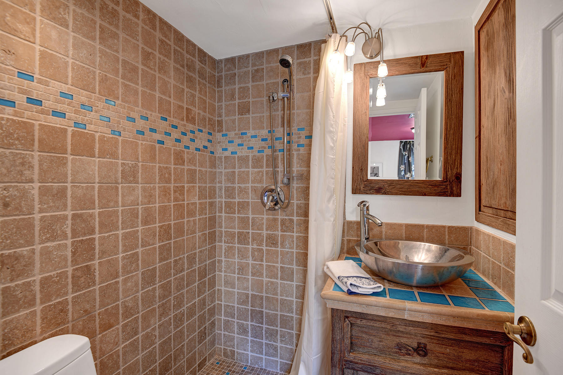 71677 Tunis Road Rancho Mirage, CA 92270 - Photo 24 of 37 a bathroom with a sink a toilet and shower