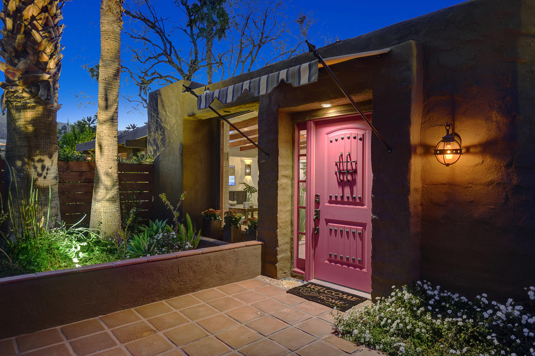 71677 Tunis Road Rancho Mirage, CA 92270 - Photo 4 of 37 a view of a entryway door of the house