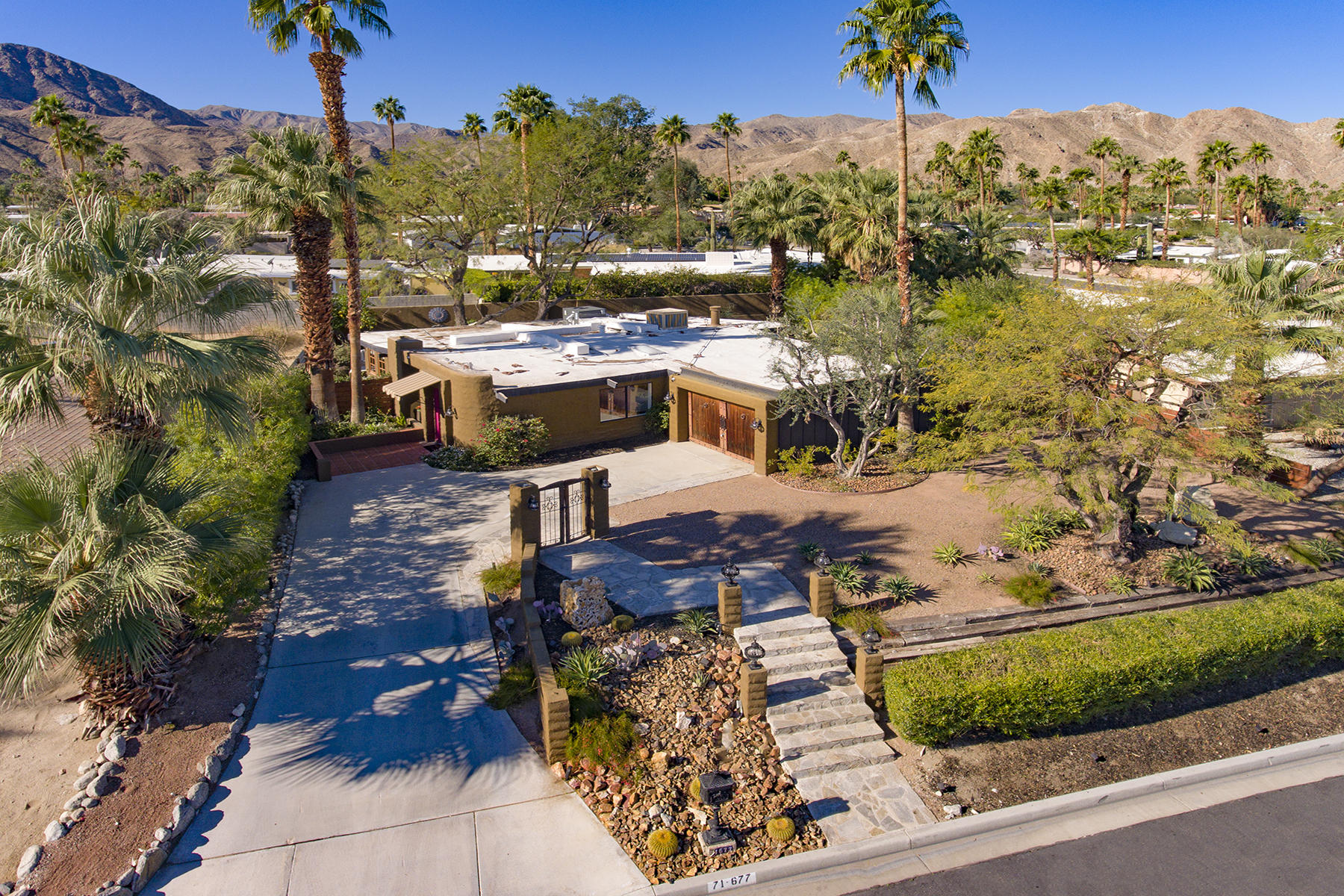 71677 Tunis Road Rancho Mirage, CA 92270 - Photo 36 of 37 an aerial view of a house with a ocean view