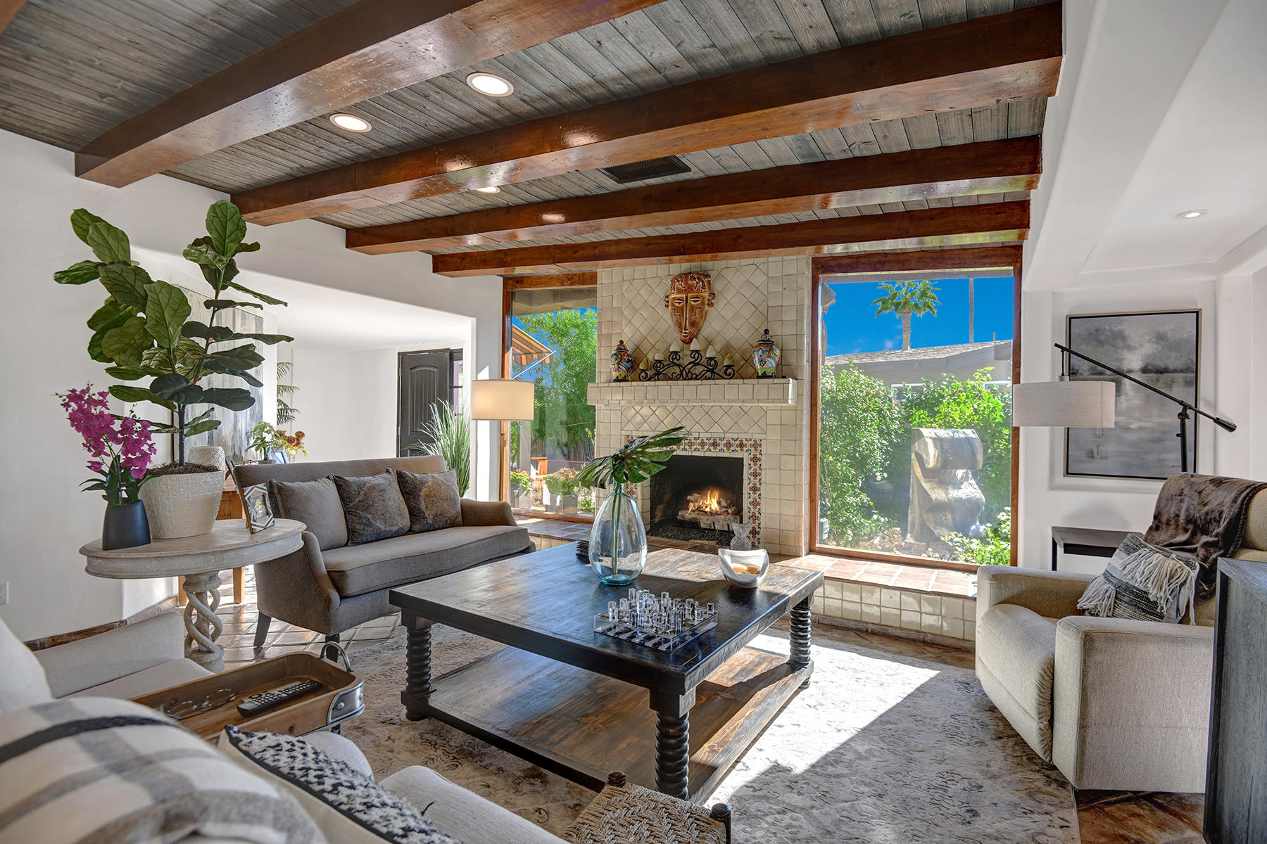 71677 Tunis Road Rancho Mirage, CA 92270 - Photo 9 of 37 a living room with furniture and a fireplace