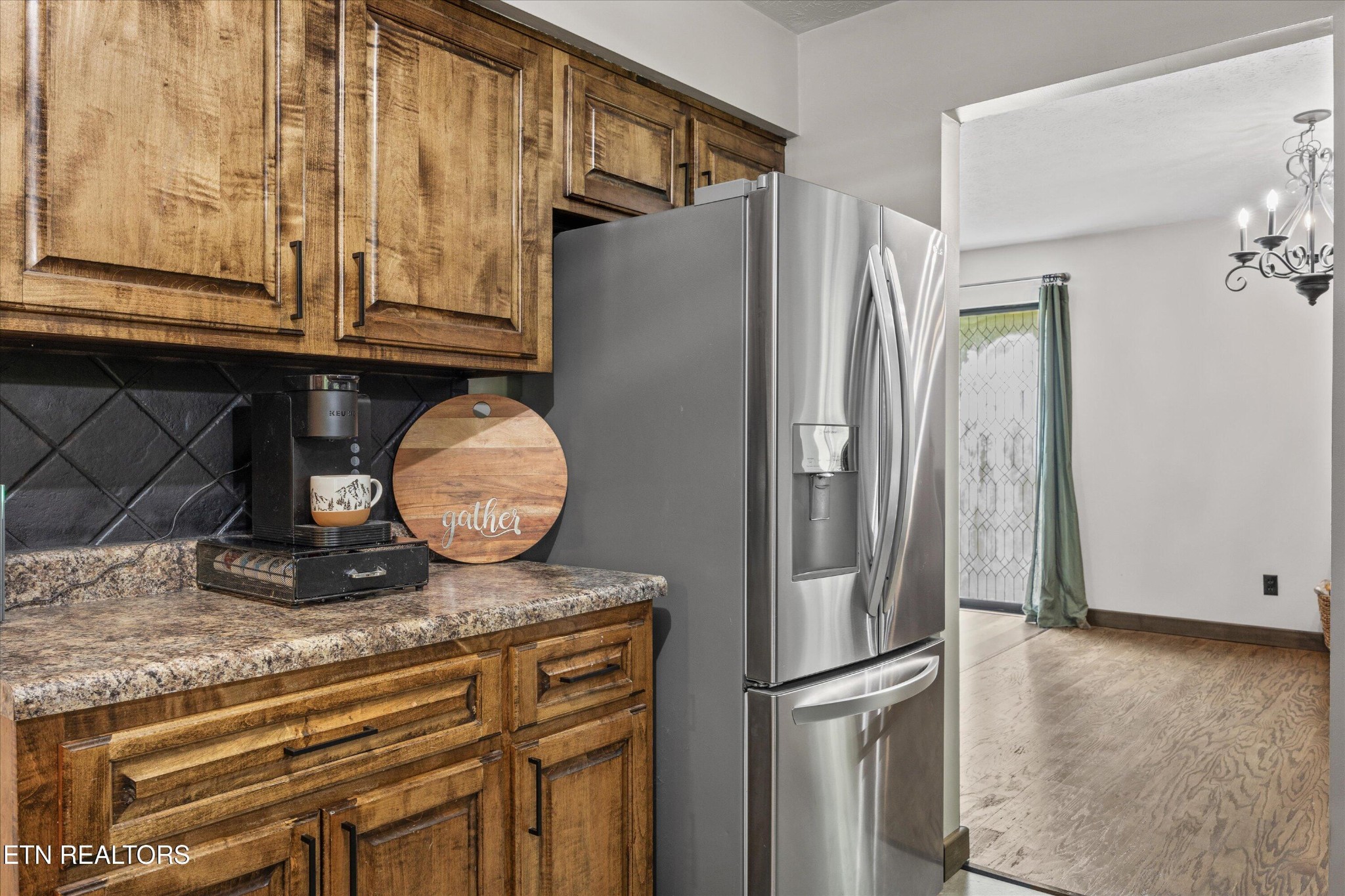 484 HC Smith Drive Oneida, TN 37841 - Photo 14 of 35 a kitchen with stainless steel appliances granite countertop a refrigerator and a stove