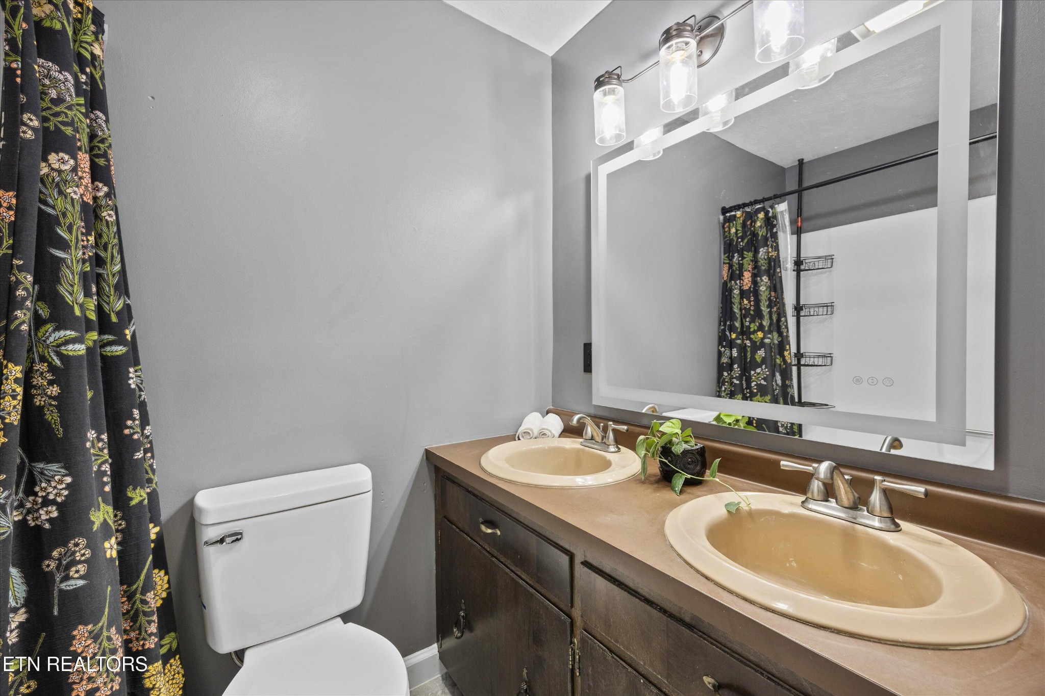 484 HC Smith Drive Oneida, TN 37841 - Photo 18 of 35 a bathroom with a sink and a toilet