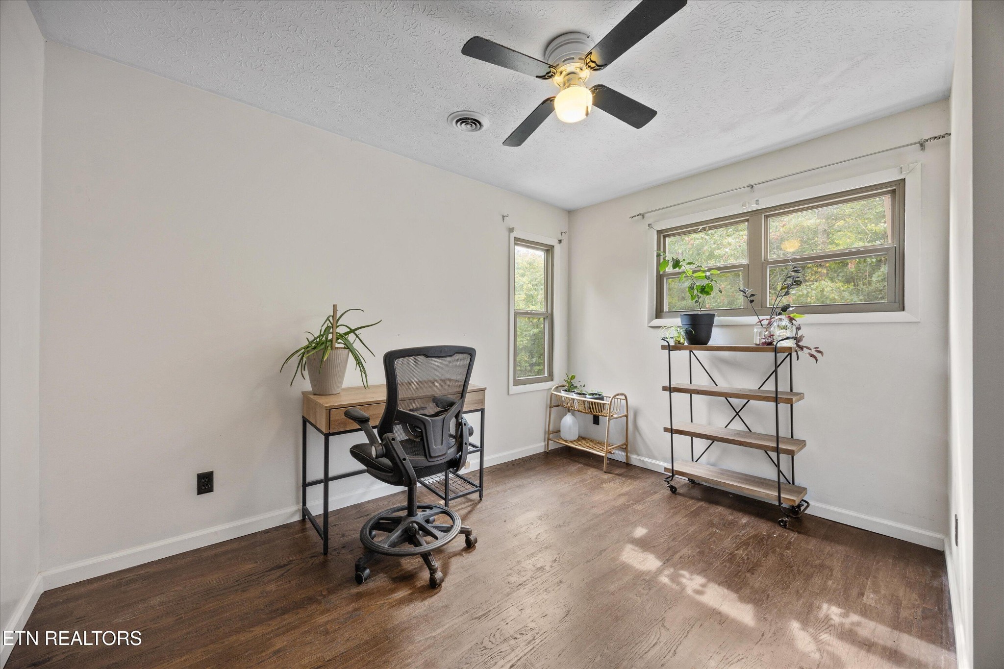 484 HC Smith Drive Oneida, TN 37841 - Photo 19 of 35 a view of a workspace with furniture and a window