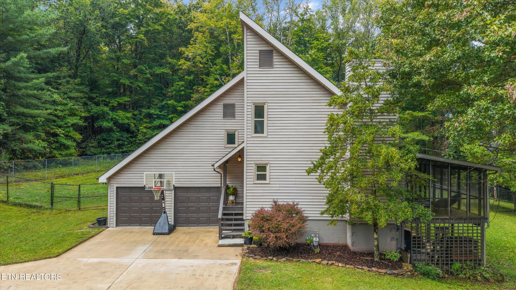 484 HC Smith Drive Oneida, TN 37841 - Photo 2 of 35 a view of a house and outdoor space