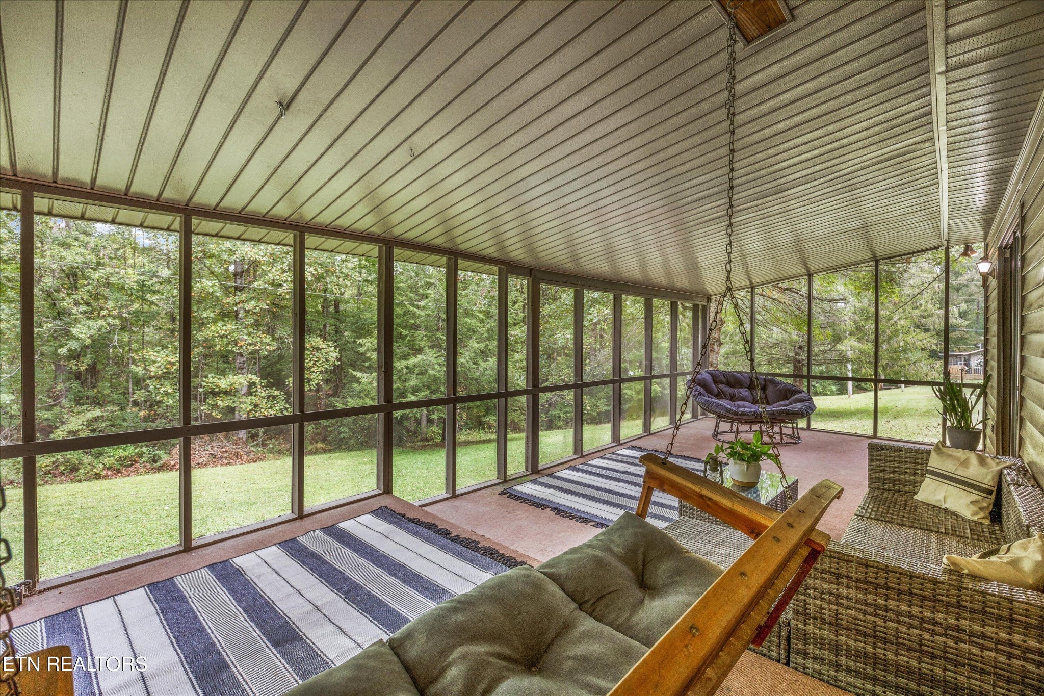 484 HC Smith Drive Oneida, TN 37841 - Photo 23 of 35 a bedroom with furniture and a large window