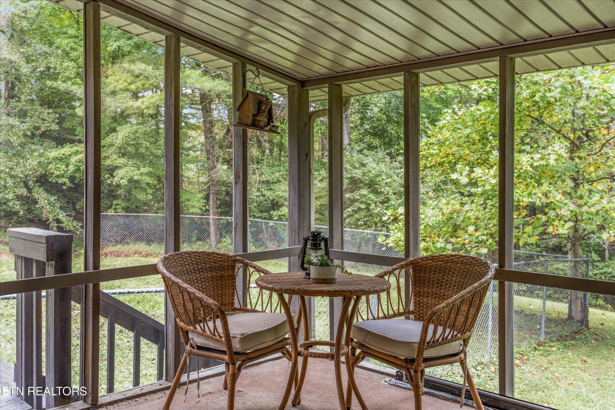 484 HC Smith Drive Oneida, TN 37841 - Photo 24 of 35 a view of a patio with a table chairs and backyard