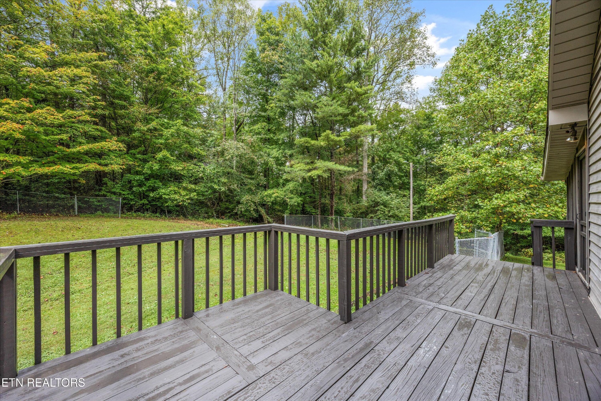 484 HC Smith Drive Oneida, TN 37841 - Photo 27 of 35 a view of balcony with wooden floor