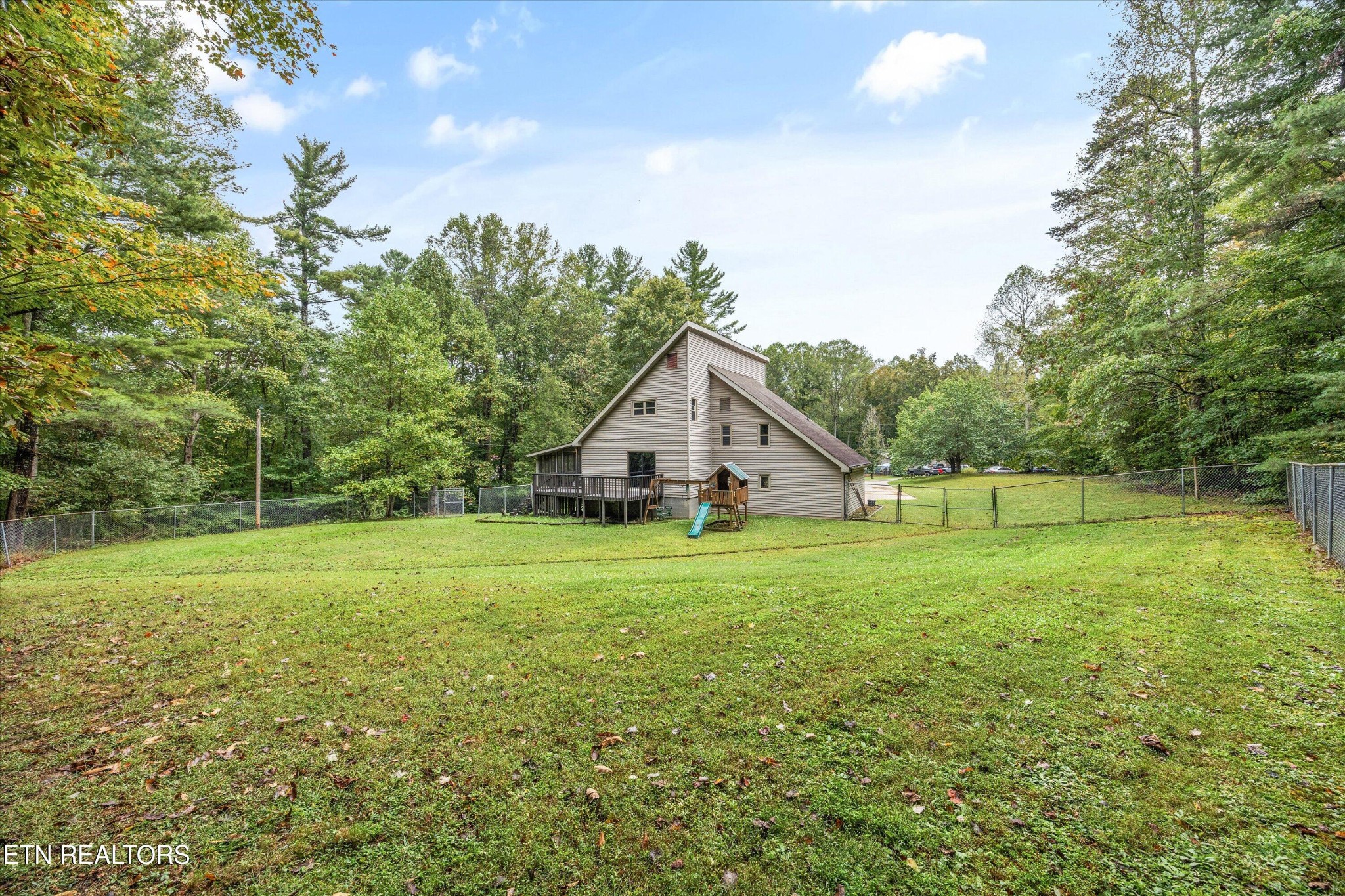 484 HC Smith Drive Oneida, TN 37841 - Photo 30 of 35 a house view with a garden space