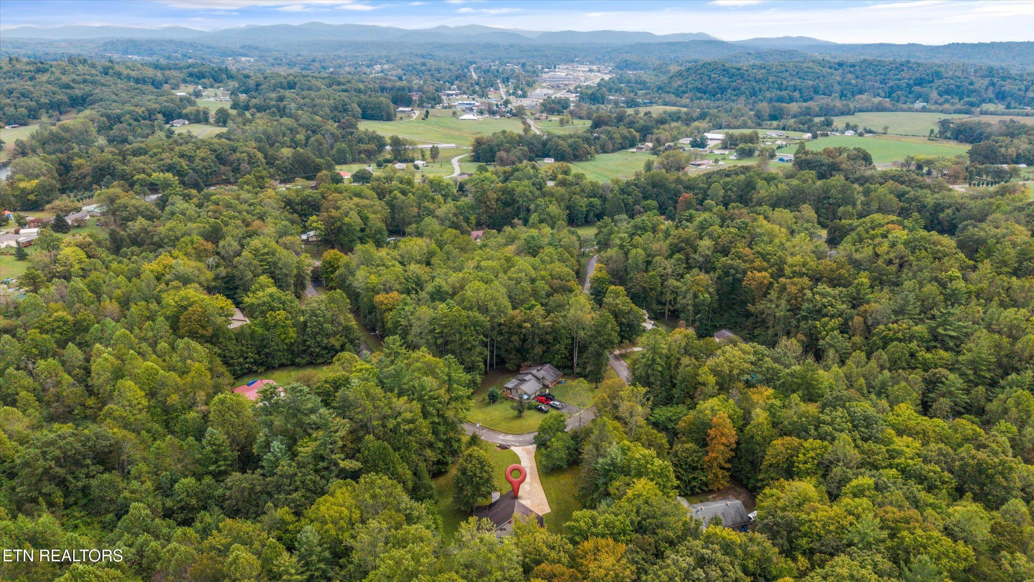 484 HC Smith Drive Oneida, TN 37841 - Photo 35 of 35 an aerial view of residential house with outdoor space and trees all around