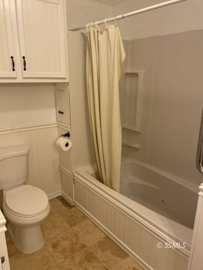 337 Peg Street Ridgecrest, CA 93555 - Photo 17 of 33 a bathroom with a toilet and a shower