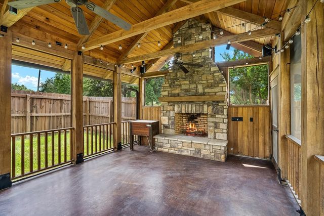 a view of a porch with furniture
