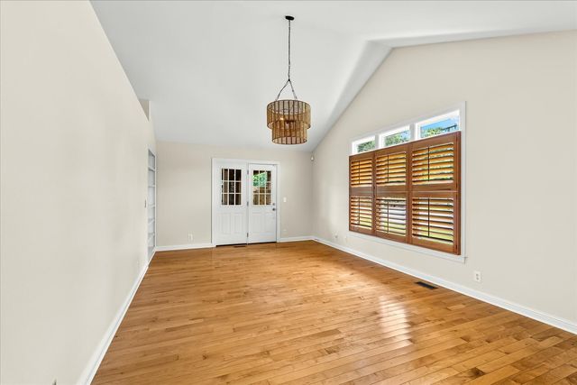 a view of a room with windows