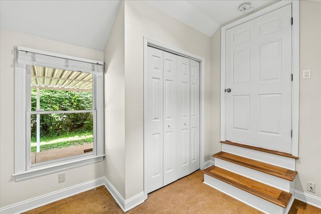 a view of room with window and interior