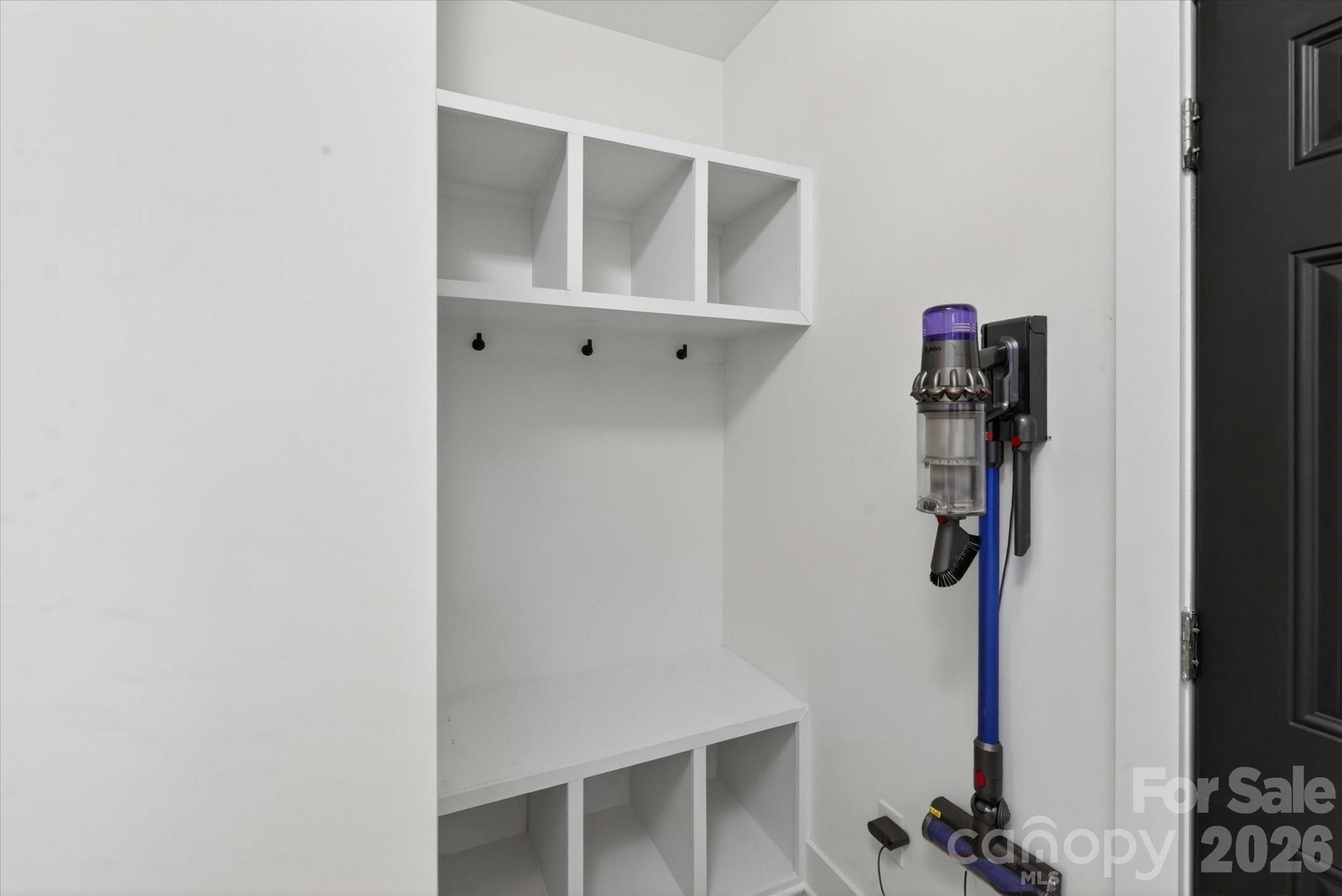 1608 Chippendale Road Charlotte, NC 28205 - Photo 30 of 46 a view of walk in closet with clothes and shoes