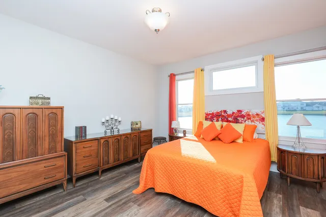 a bathroom with a shower and a toilet