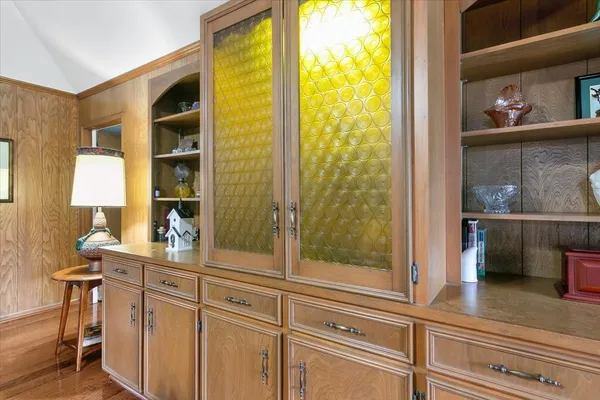 a kitchen with a sink and cabinets