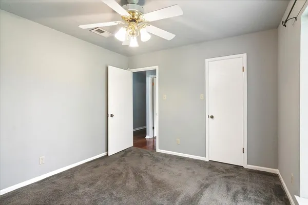 wooden floor and window in a room
