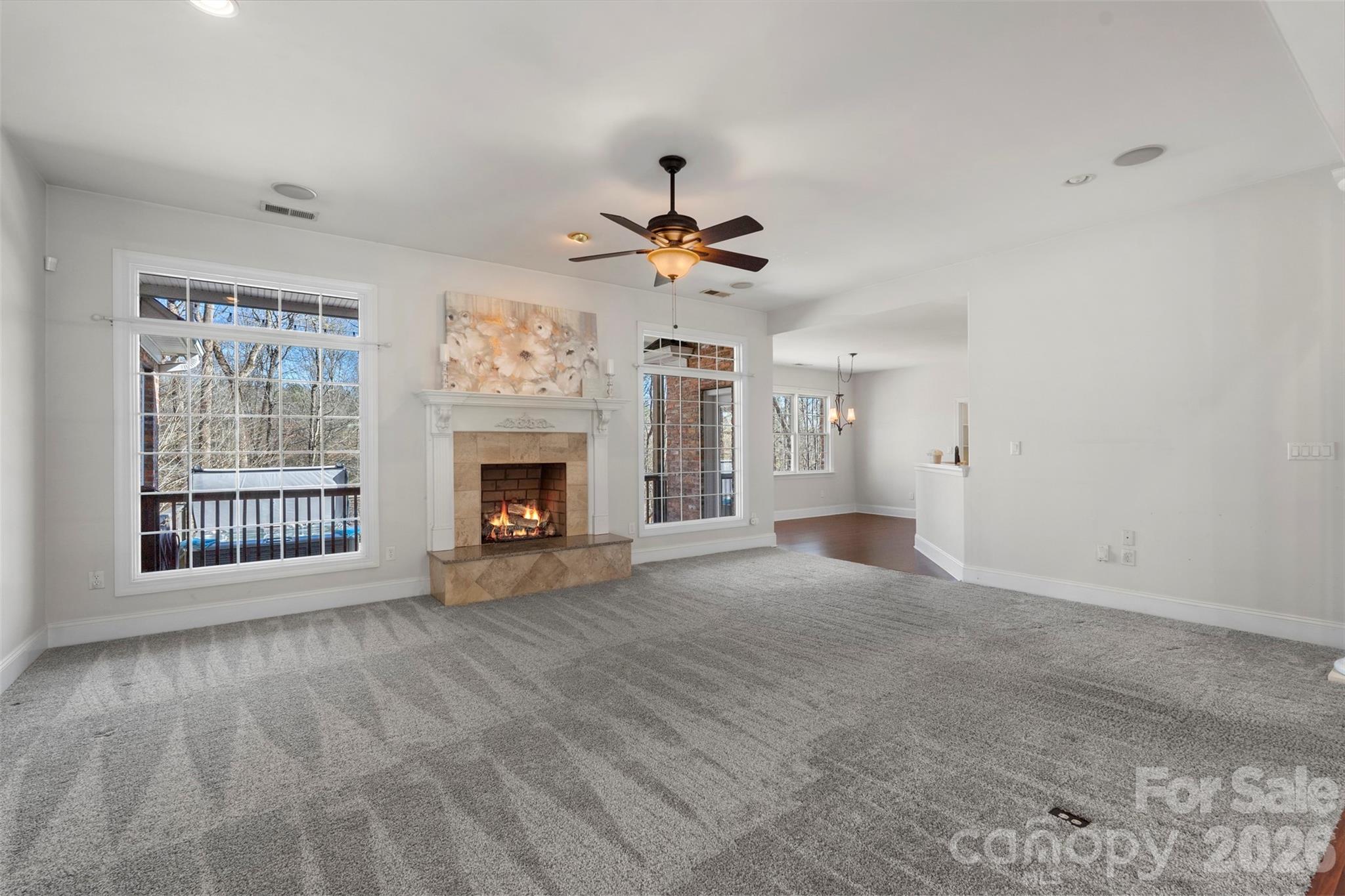 12711 Moores Chapel Road Charlotte, NC 28214 - Photo 19 of 48 a view of an empty room with a fireplace