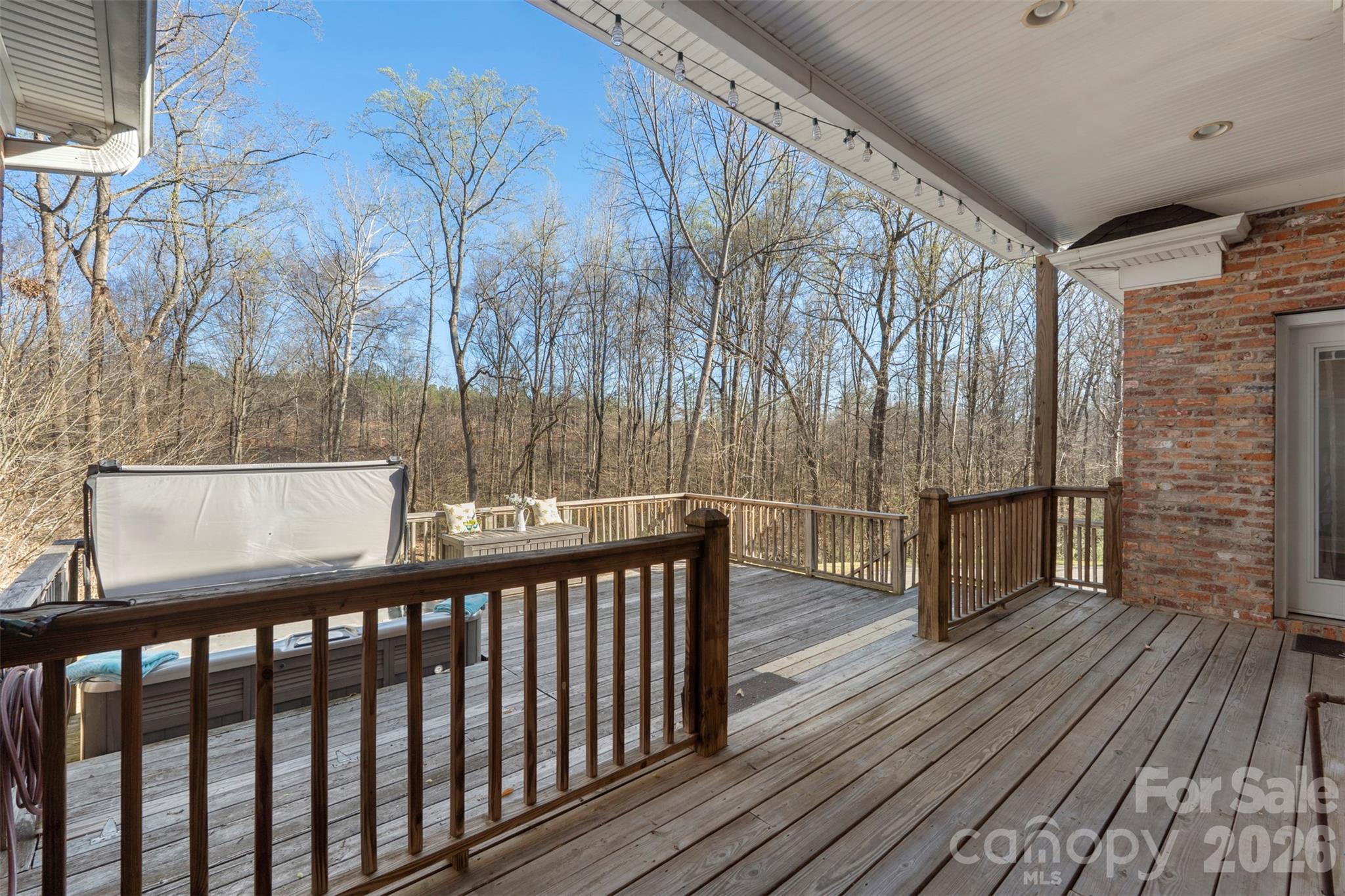 12711 Moores Chapel Road Charlotte, NC 28214 - Photo 37 of 48 a view of a wooden balcony with furniture
