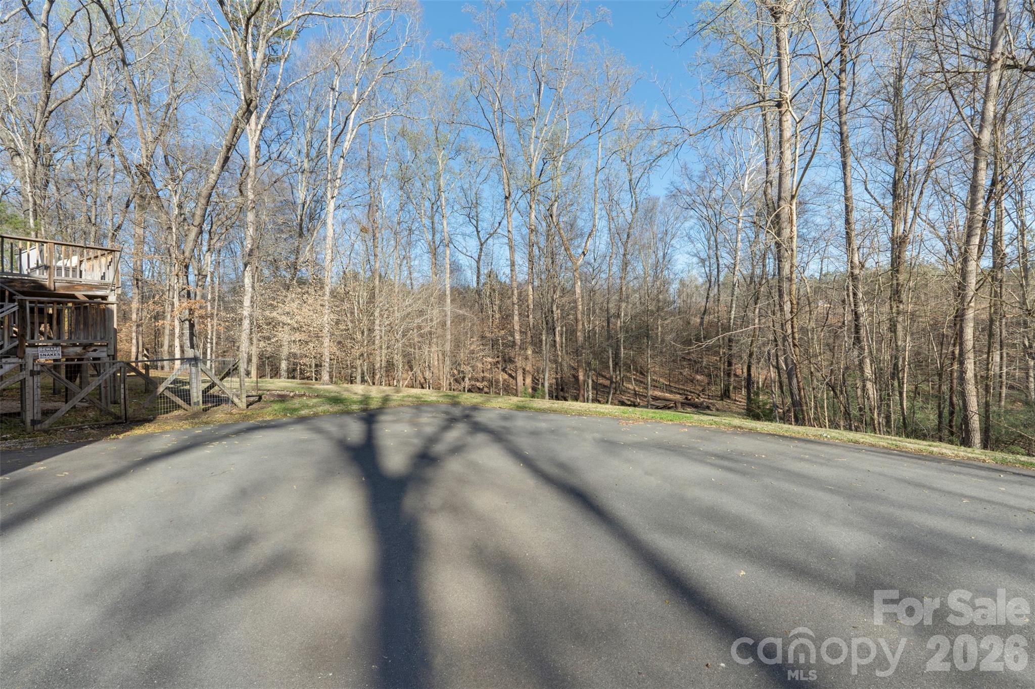 12711 Moores Chapel Road Charlotte, NC 28214 - Photo 39 of 48 a view of a street with a building in the background