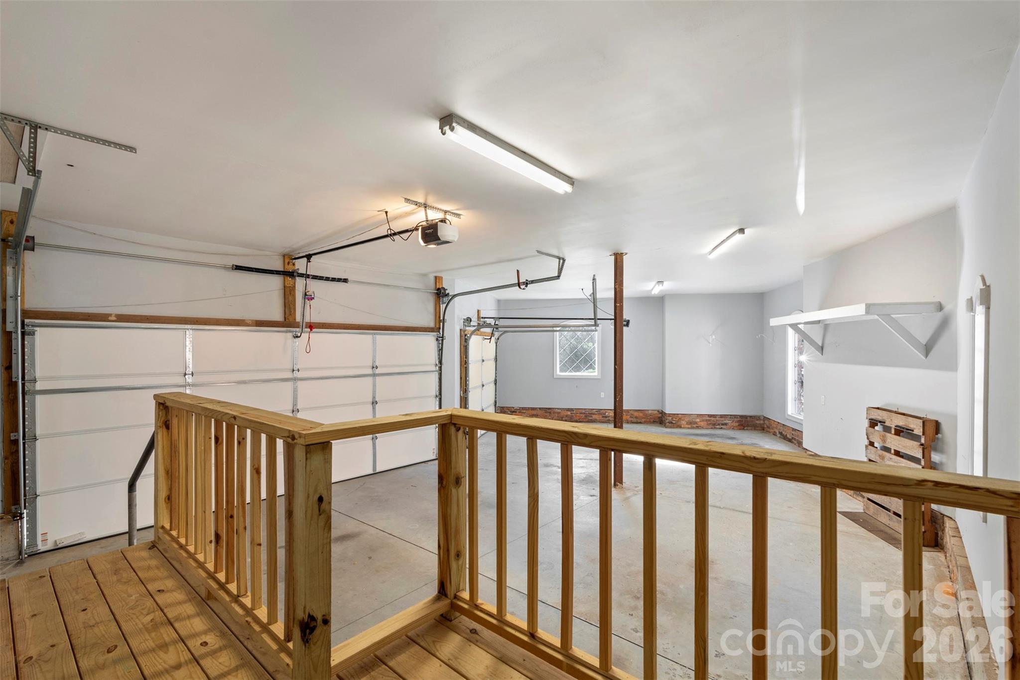 12711 Moores Chapel Road Charlotte, NC 28214 - Photo 40 of 48 a view of a hallway with stairs