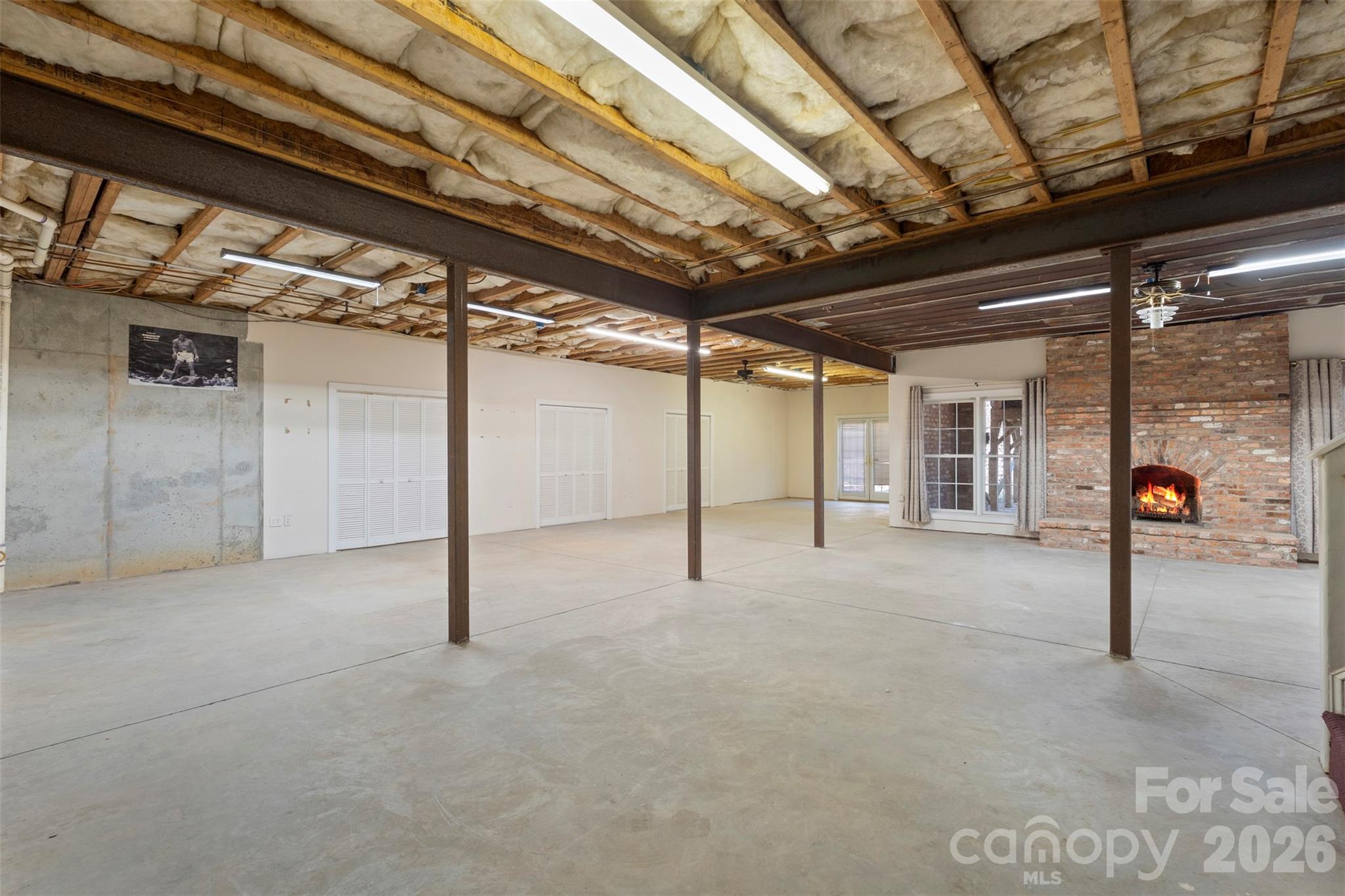 12711 Moores Chapel Road Charlotte, NC 28214 - Photo 44 of 48 a view of empty room with wooden ceiling